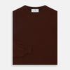View 3 of product The Turnbull & Asser Port Cashmere Crew Neck Jumper, in dark brown, features a plain design with long sleeves and is shown laid flat on a white background.
