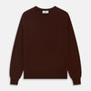 View 1 of product The Turnbull & Asser Port Cashmere Crew Neck Jumper, in dark brown, features a plain design with long sleeves and is shown laid flat on a white background.