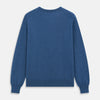 View 4 of product The Turnbull & Asser Blue Crew Neck Cashmere Jumper is laid flat on a white background, showcasing ribbed cuffs, hem, and neckline for an elegant, smart-casual style.