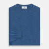 View 3 of product The Turnbull & Asser Blue Crew Neck Cashmere Jumper is laid flat on a white background, showcasing ribbed cuffs, hem, and neckline for an elegant, smart-casual style.
