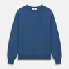 View 1 of product The Turnbull & Asser Blue Crew Neck Cashmere Jumper is laid flat on a white background, showcasing ribbed cuffs, hem, and neckline for an elegant, smart-casual style.