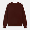 View 4 of product The Turnbull & Asser Port Cashmere V-Neck Jumper is a plain, long-sleeved burgundy sweater with a V-neck, shown flat on a white background.
