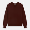 View 1 of product The Turnbull & Asser Port Cashmere V-Neck Jumper is a plain, long-sleeved burgundy sweater with a V-neck, shown flat on a white background.