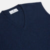 View 2 of product A neatly folded Turnbull & Asser Navy V-Neck Cashmere Slipover is displayed on a plain white background, its inner neckline label visible.