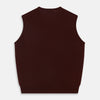 View 3 of product The Turnbull & Asser Port V-Neck Cashmere Slipover is a sleeveless, dark maroon vest with a simple design, shown laid flat on a white background—ideal for layering over a shirt or under a suit jacket.