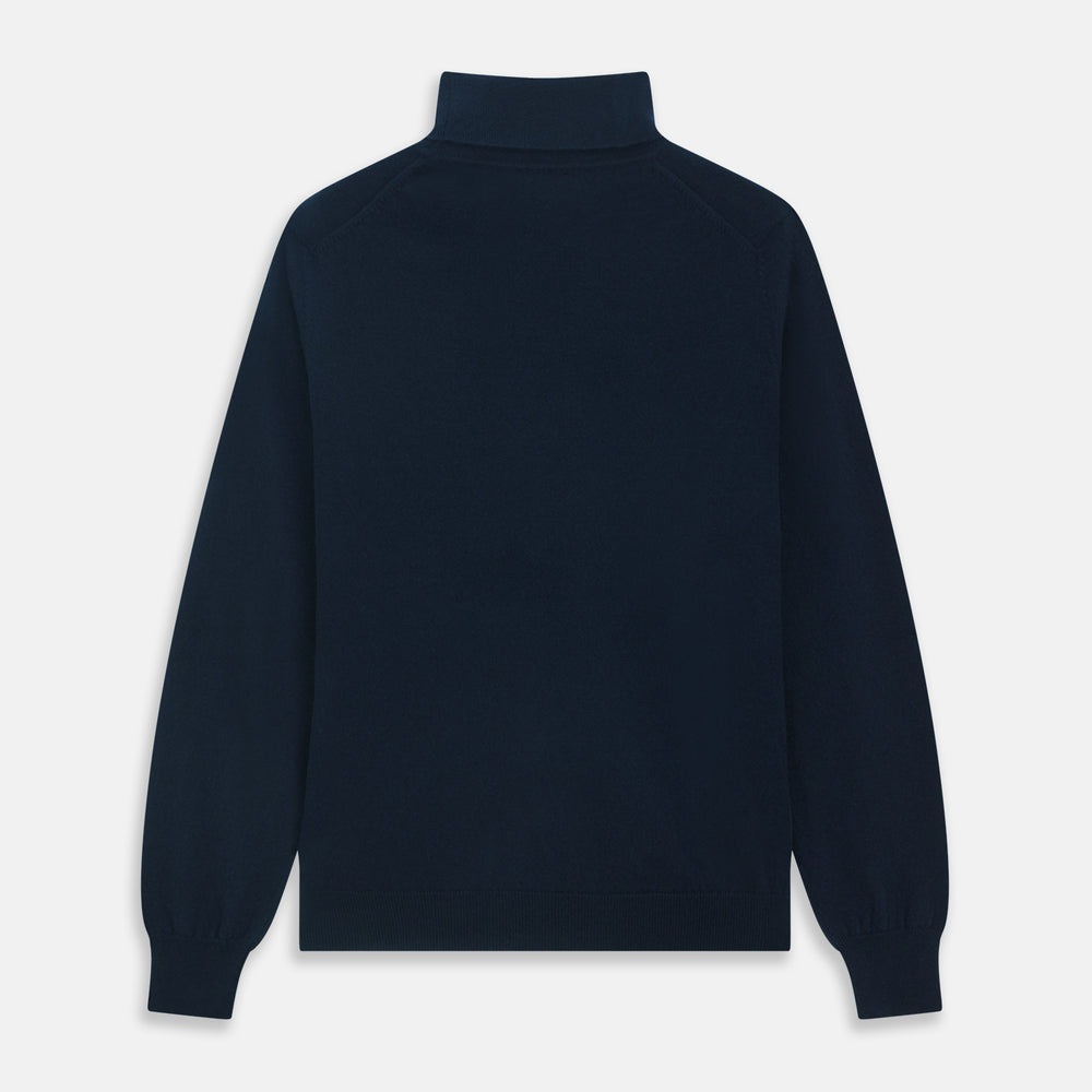 The Turnbull & Asser Navy Cashmere Roll Neck Jumper, with ribbed cuffs and hem, is a timeless autumn essential. Shown laid flat on a white background, this plain long-sleeved sweater offers classic style and comfort.