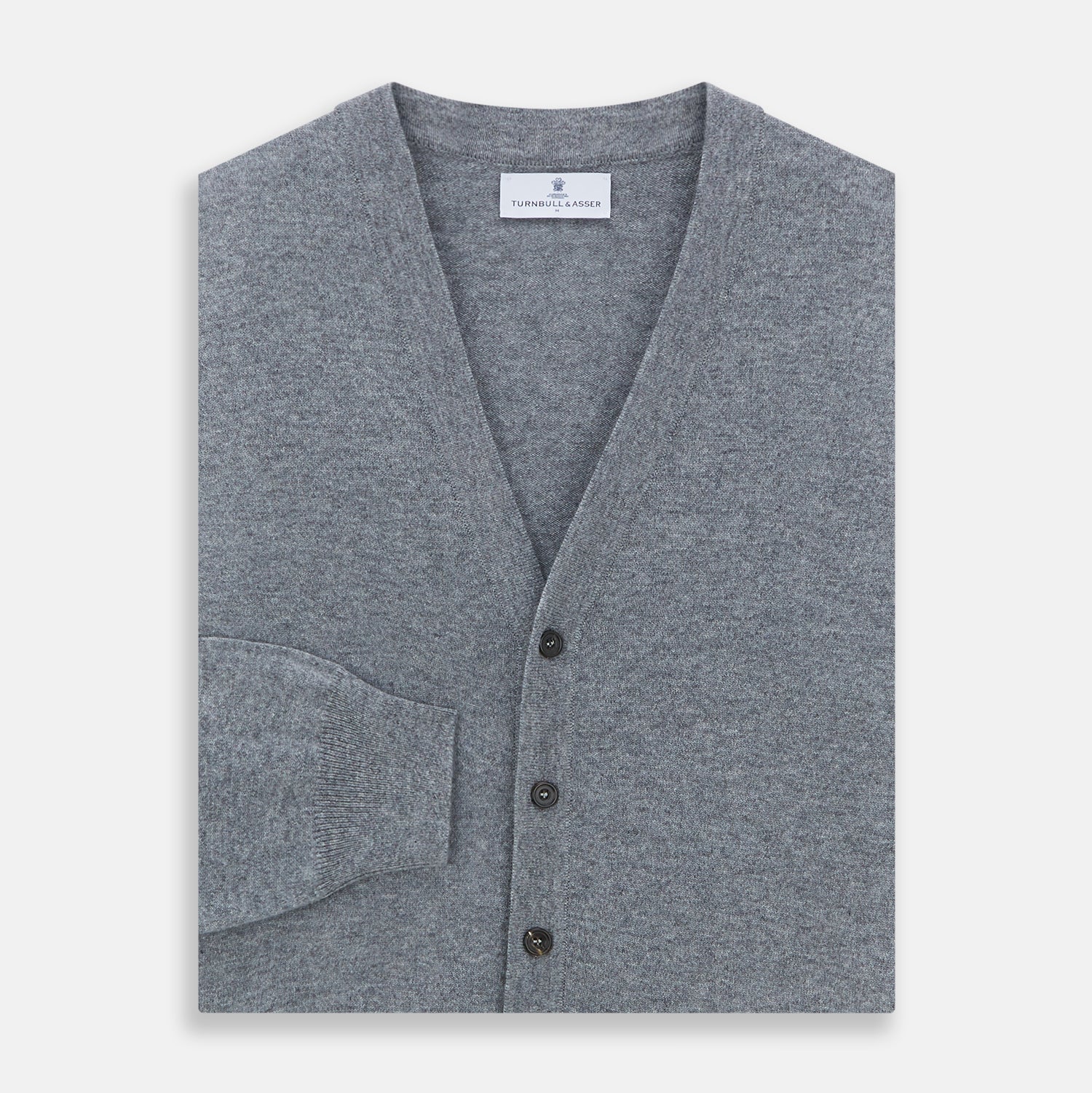 View 3 of product The Louis Flannel Grey Cashmere Cardigan by Turnbull & Asser features long sleeves, a V-neck, black front buttons, and two front pockets, making it ideal for transitional seasons. Shown laid flat on a white background.