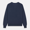 View 4 of product The Blue V-Neck Merino Wool Jumper by Turnbull & Asser features long sleeves, ribbed cuffs, and a ribbed hem—a timeless essential for any gentleman's wardrobe, shown laid flat on a white background.