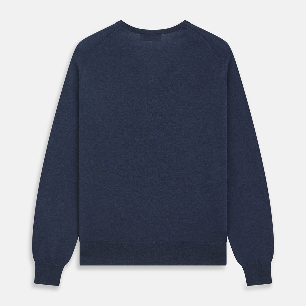 The Blue V-Neck Merino Wool Jumper by Turnbull & Asser features long sleeves, ribbed cuffs, and a ribbed hem—a timeless essential for any gentleman's wardrobe, shown laid flat on a white background.
