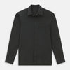 View 1 of product The Moss Green Pique Shirt by Turnbull & Asser, featuring long sleeves, a button-up front, collar, and single chest pocket, is laid flat on a white background for a refined take on classic style.