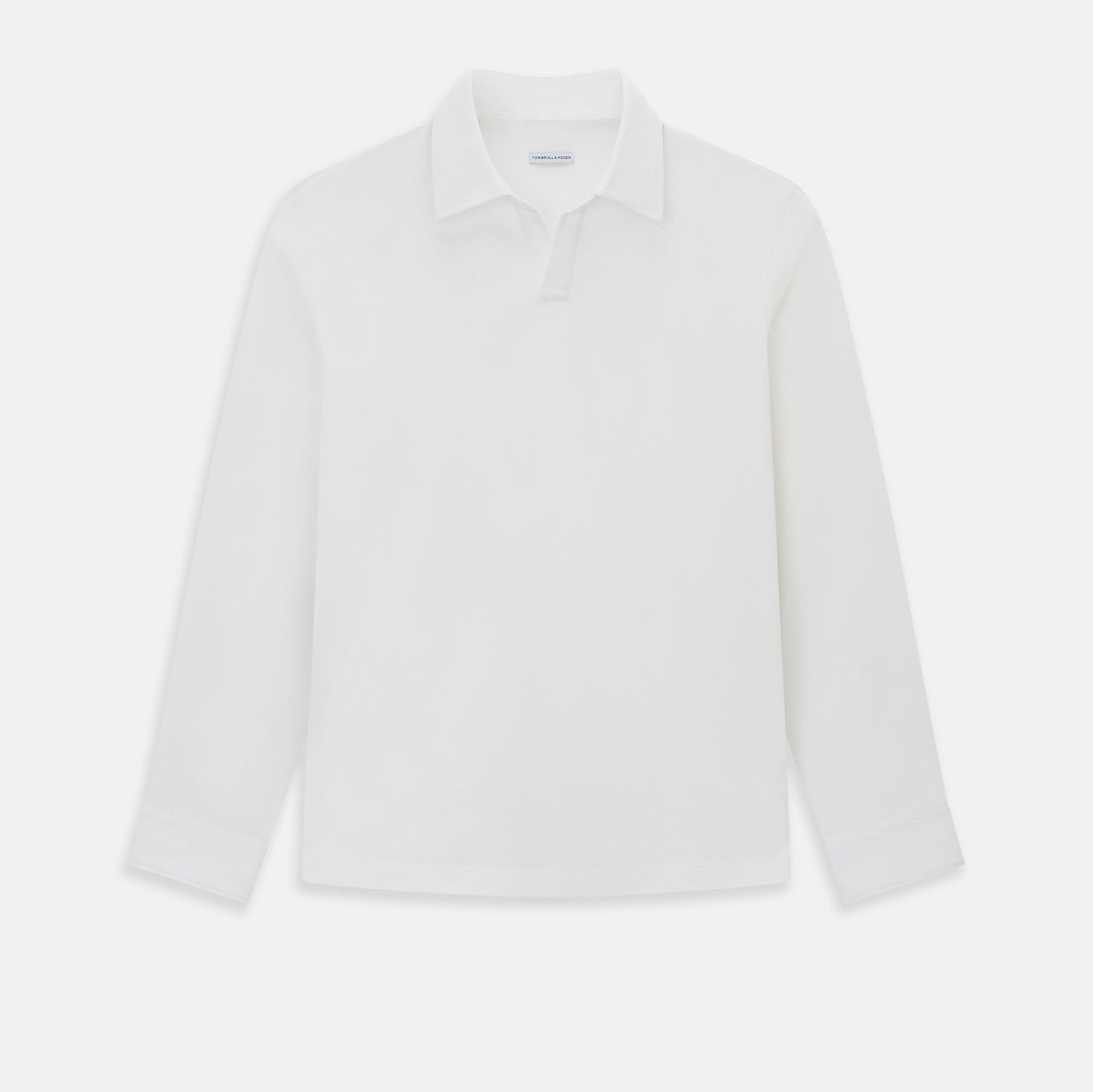View 1 of product A Cream Rugby Polo Shirt in Cotton by Turnbull & Asser UK, featuring long sleeves, a collar, and a partial button placket, is displayed on a white background.