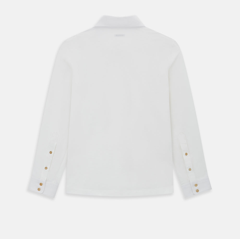 A Cream Rugby Polo Shirt in Cotton by Turnbull & Asser UK, featuring long sleeves, a collar, and a partial button placket, is displayed on a white background.