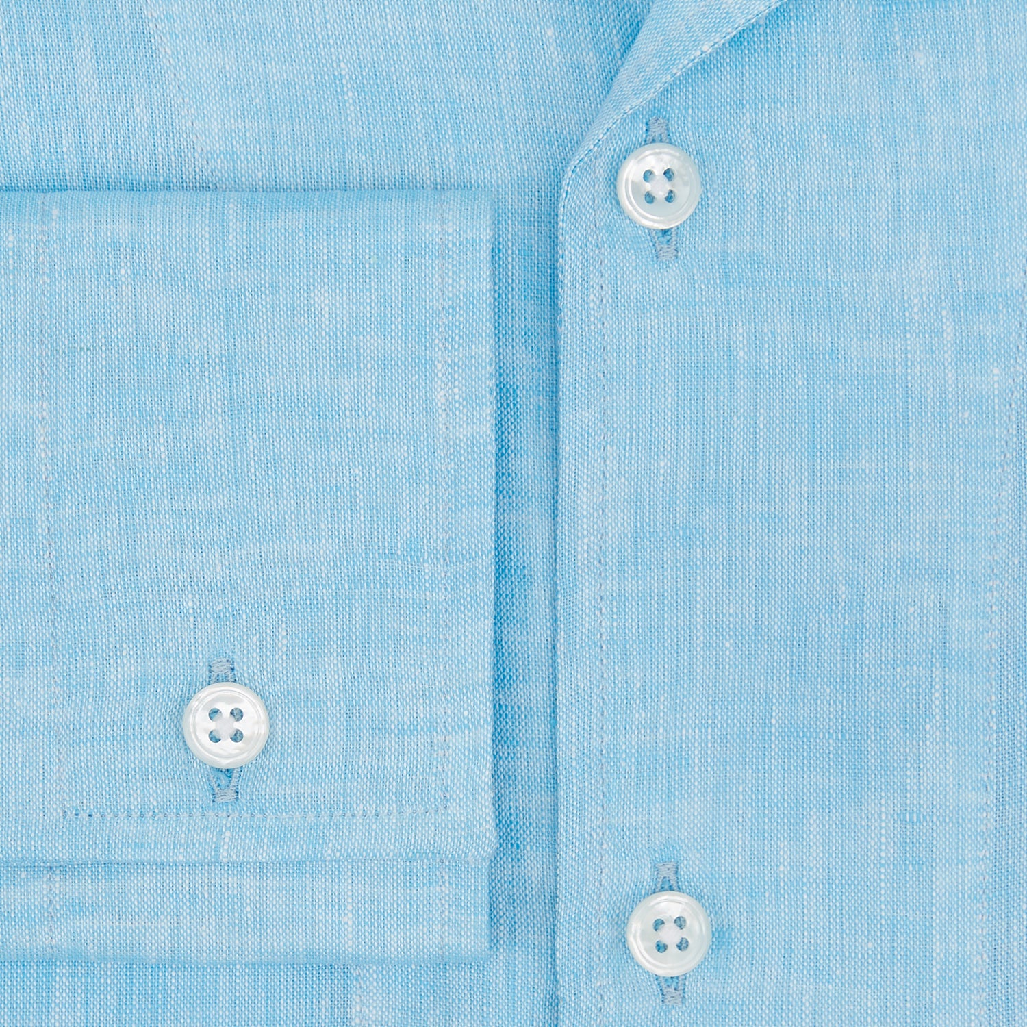 View 4 of product The QUARZO NIGHTSHIRT TURQUOISE LINEN by Turnbull & Asser is a relaxed-fit, long-sleeve collared nightshirt in soft turquoise linen, featuring a chest pocket and button placket, shown laid flat on a white background.