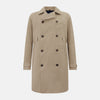 View 1 of product The Sand Long Albert Trench Coat by Turnbull & Asser UK features a double-breasted design, dark buttons, notched collar, and two slanted front pockets, offering timeless British style. Shown against a plain white background.