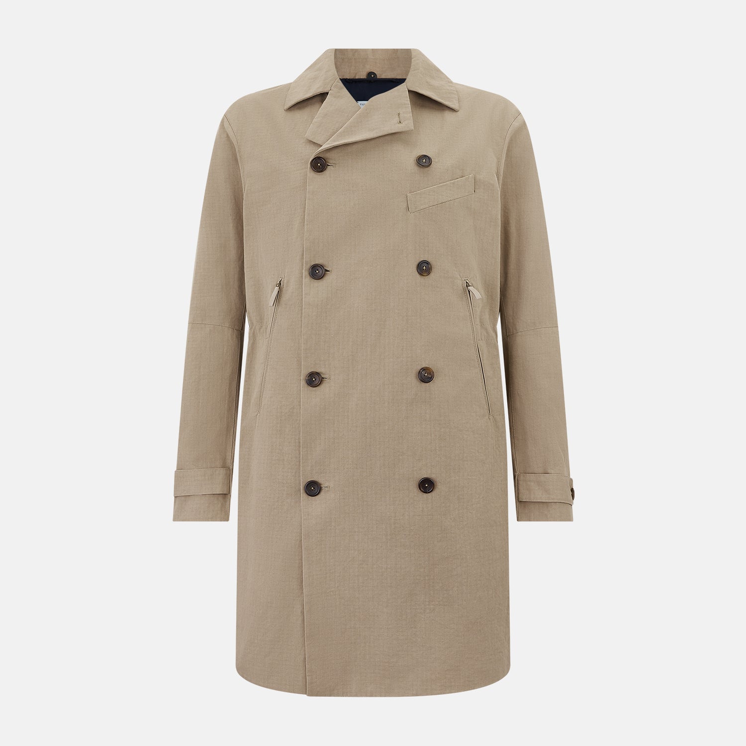 View 1 of product The Sand Long Albert Trench Coat by Turnbull & Asser UK features a double-breasted design, dark buttons, notched collar, and two slanted front pockets, offering timeless British style. Shown against a plain white background.
