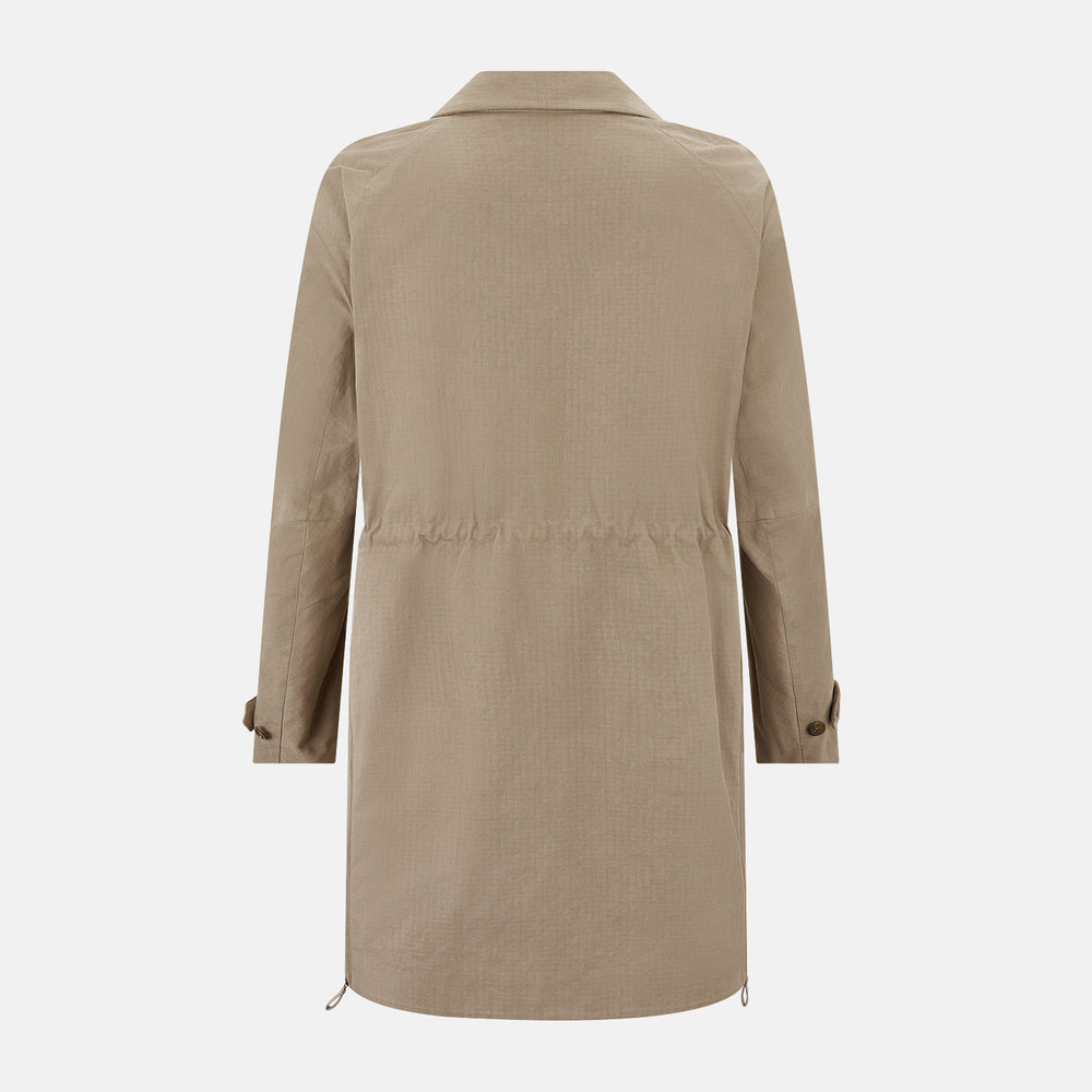 The Sand Long Albert Trench Coat by Turnbull & Asser UK features a double-breasted design, dark buttons, notched collar, and two slanted front pockets, offering timeless British style. Shown against a plain white background.