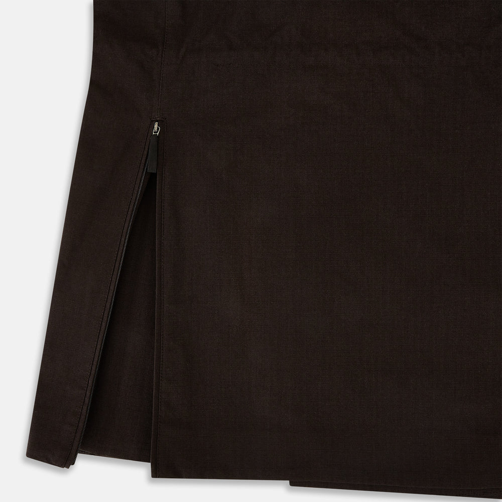 The Turnbull & Asser UK Dark Chocolate Short Albert Trench Coat features a double-breasted style, black buttons, notched collar, chest pocket, two side zip pockets, and adjustable cuff straps—shown on a plain white background.