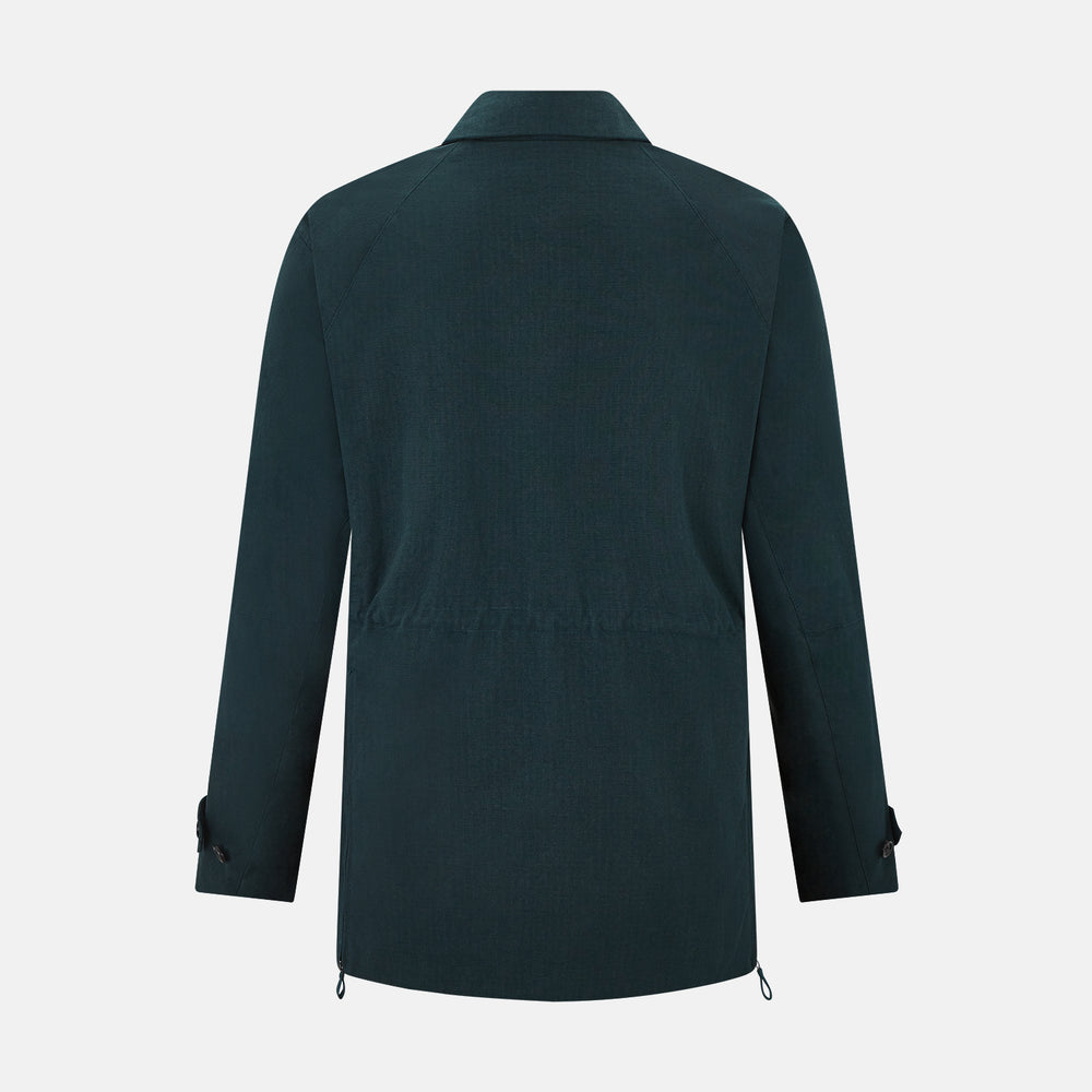 Turnbull & Asser UK's Forest Green Short Albert Trench Coat features a double-breasted design, black buttons, front chest pocket, two zippered side pockets, and strapped cuffs, shown against a plain white background.