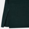View 6 of product Turnbull & Asser UK's Forest Green Short Albert Trench Coat features a double-breasted design, black buttons, front chest pocket, two zippered side pockets, and strapped cuffs, shown against a plain white background.