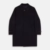 View 1 of product The Turnbull & Asser Dark Navy Cashmere Storm System Smith Coat, featuring a classic collar, buttoned front, side pockets, and buttoned cuffs, is shown laid flat on a white background.