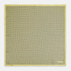 View 4 of product A Floral Yellow Pocket Square in Silk by Turnbull & Asser UK, showcasing a repeating black geometric pattern with subtle floral motifs and the brand logo in one corner. One corner of the fabric is folded over to display the reverse side.