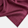 View 2 of product A folded Floral Burgundy Pocket Square in Silk by Turnbull & Asser UK, adorned with pink floral geometric motifs and featuring the Turnbull & Asser logo in the bottom right corner.