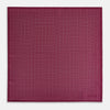 View 4 of product A folded Floral Burgundy Pocket Square in Silk by Turnbull & Asser UK, adorned with pink floral geometric motifs and featuring the Turnbull & Asser logo in the bottom right corner.