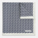 A refined double-sided design, the Floral White Pocket Square in Silk by Turnbull & Asser UK features a small blue floral pattern on white silk, neatly folded to display both its intricate front and bordered corner—adding subtle elegance to any ensemble.