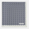 View 3 of product A refined double-sided design, the Floral White Pocket Square in Silk by Turnbull & Asser UK features a small blue floral pattern on white silk, neatly folded to display both its intricate front and bordered corner—adding subtle elegance to any ensemble.