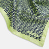 View 2 of product Introducing the Floral Green Pocket Square in Silk by Turnbull & Asser UK—a sophisticated accessory in light green silk, adorned with a delicate floral pattern and a folded corner. The pocket square features a refined double-sided design, with the Turnbull & Asser UK brand name elegantly printed on one corner.