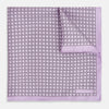 View 1 of product Crafted by Turnbull & Asser UK, the Geometric Lilac Pocket Square in Silk features an elegant square pattern in lilac hues, accented by a solid lavender border. When folded, it tastefully displays a glimpse of the sophisticated patterned underside.