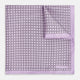 Crafted by Turnbull & Asser UK, the Geometric Lilac Pocket Square in Silk features an elegant square pattern in lilac hues, accented by a solid lavender border. When folded, it tastefully displays a glimpse of the sophisticated patterned underside.