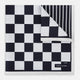 A square silk pocket square featuring a navy-on-white chequered pattern, labeled Turnbull & Asser UK with 2 of 20 in the bottom right corner—part of the limited edition Chequered Navy on White Frame Pocket Square from the Driver’s Capsule Collection.