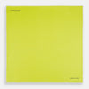 View 4 of product The Canary Yellow Piped Silk Pocket Square by Turnbull & Asser features white edges and black branding in the bottom right corner, making it a perfect accessory for formal attire. Shown on a plain white background.
