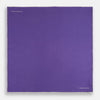 View 4 of product The Turnbull & Asser Violet and Ecru Piped Silk Pocket Square features a stitched edge and white brand logo, making it an elegant addition to formalwear.