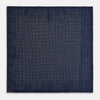 View 5 of product The Checked Blue Pocket Square in Silk by Turnbull & Asser UK features a navy base with a light blue grid pattern on one side and a refined dotted design on the other. This double-sided accessory is shown partially folded to elegantly showcase both distinctive patterns.
