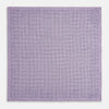 View 5 of product The Checked Lilac Pocket Square in Silk by Turnbull & Asser UK features a grid pattern in purple with a solid border, neatly folded to display its double-sided design and contrasting black and white dotted squares on the reverse side.