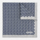 A square silk pocket square from Turnbull & Asser UK, featuring a subtle floral grey pattern; one corner is folded to reveal its double-sided design with a complementary pattern on the reverse side.