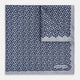 The Turnbull & Asser UK Floral Blue Pocket Square in Silk showcases a refined double-sided design, with a clustered dot pattern in blue and white on the front and a delicate fine dotted motif on the back. Presented with one corner elegantly folded, it exudes sophisticated style.