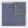 View 4 of product The Turnbull & Asser UK Floral Blue Pocket Square in Silk showcases a refined double-sided design, with a clustered dot pattern in blue and white on the front and a delicate fine dotted motif on the back. Presented with one corner elegantly folded, it exudes sophisticated style.