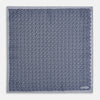 View 5 of product The Turnbull & Asser UK Floral Blue Pocket Square in Silk showcases a refined double-sided design, with a clustered dot pattern in blue and white on the front and a delicate fine dotted motif on the back. Presented with one corner elegantly folded, it exudes sophisticated style.