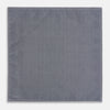 View 6 of product The Turnbull & Asser UK Floral Blue Pocket Square in Silk showcases a refined double-sided design, with a clustered dot pattern in blue and white on the front and a delicate fine dotted motif on the back. Presented with one corner elegantly folded, it exudes sophisticated style.