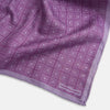 View 3 of product Certainly! Here’s a rewritten version of your sentence, incorporating the product data: The Geometric Lilac Tile Pocket Square in Silk by Turnbull & Asser UK features a lilac purple geometric pattern with a subtle square design, partially folded to reveal its double-sided construction with a contrasting black and white dotted pattern on the reverse.