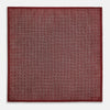 View 5 of product The Turnbull & Asser UK Geometric Burgundy Tile Pocket Square in Silk is displayed partly folded, showcasing its bold geometric grid pattern with concentric burgundy squares on the front and a contrasting black-and-white dotted design on the reverse.