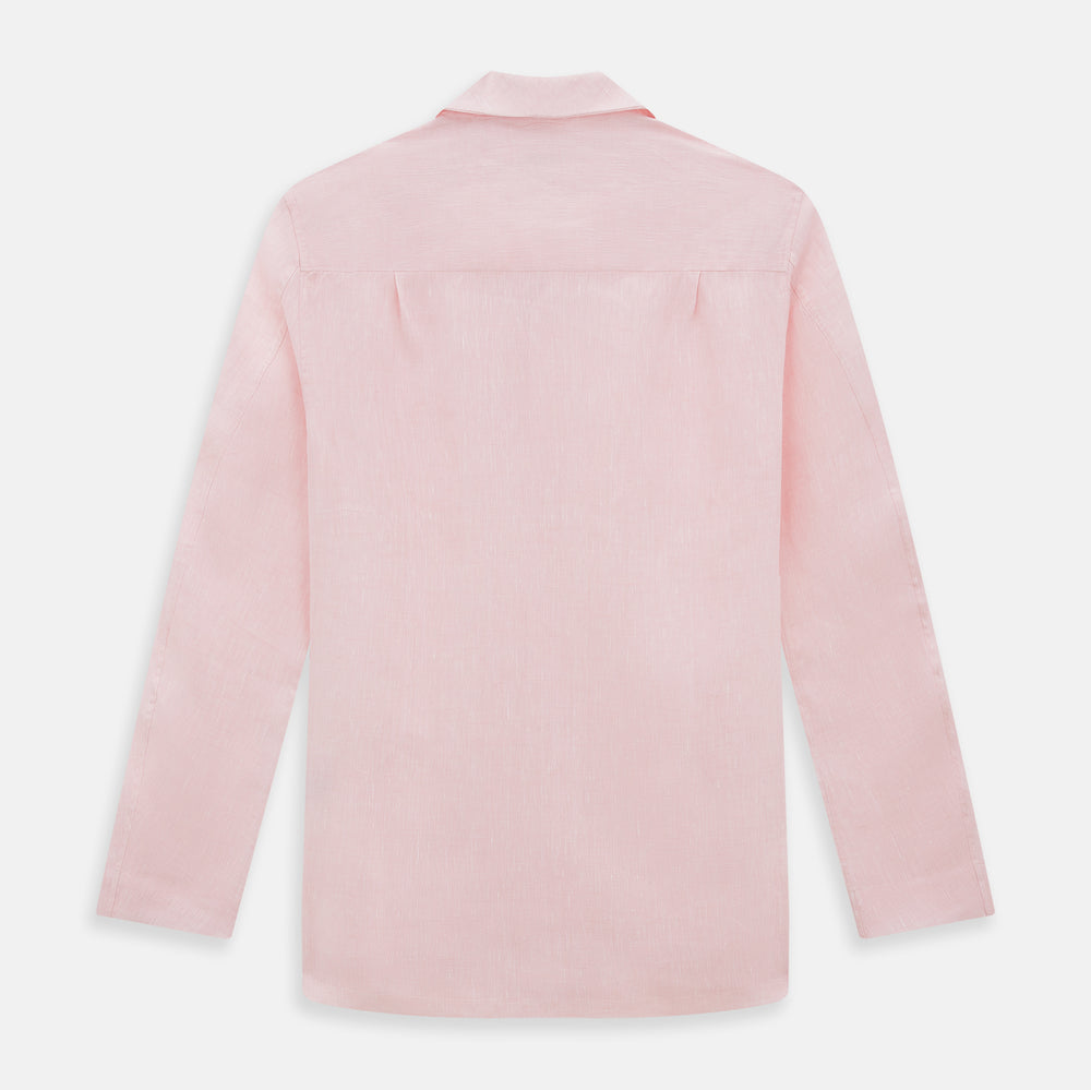 The Turnbull & Asser Pale Pink Linen Pyjama Shirt features long sleeves, a chest pocket, and a classic button-up design—ideal for stylish nightwear or relaxed homewear. Shown laid flat on a white background.