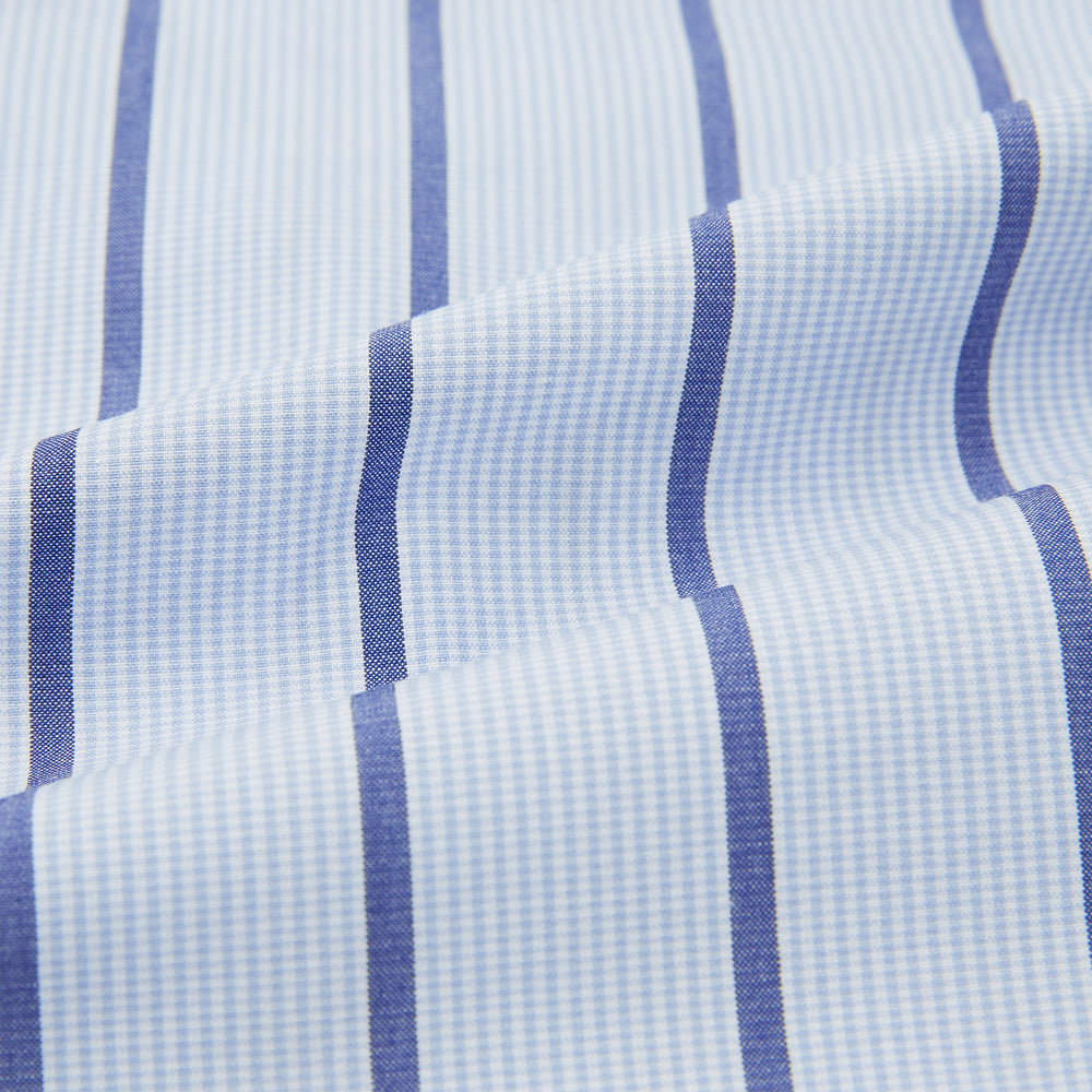 Turnbull & Asser Blue Track Stripe Pyjama Trousers in light blue cotton with dark blue vertical pinstripes and a drawstring waist, shown laid flat on a white background.
