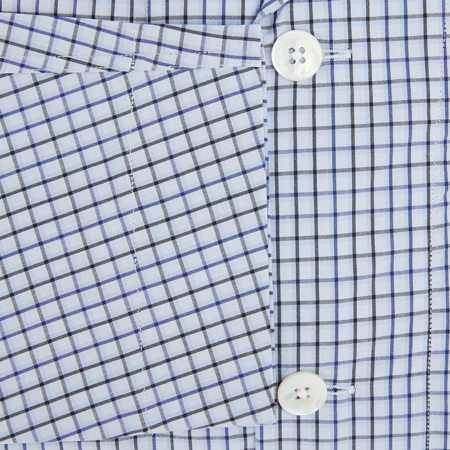 View 4 of product The Turnbull & Asser Blue Shadow Check Pyjama Shirt features long sleeves, a button-up front, collar, and chest pocket—ideal for refined loungewear or stylish nightwear.