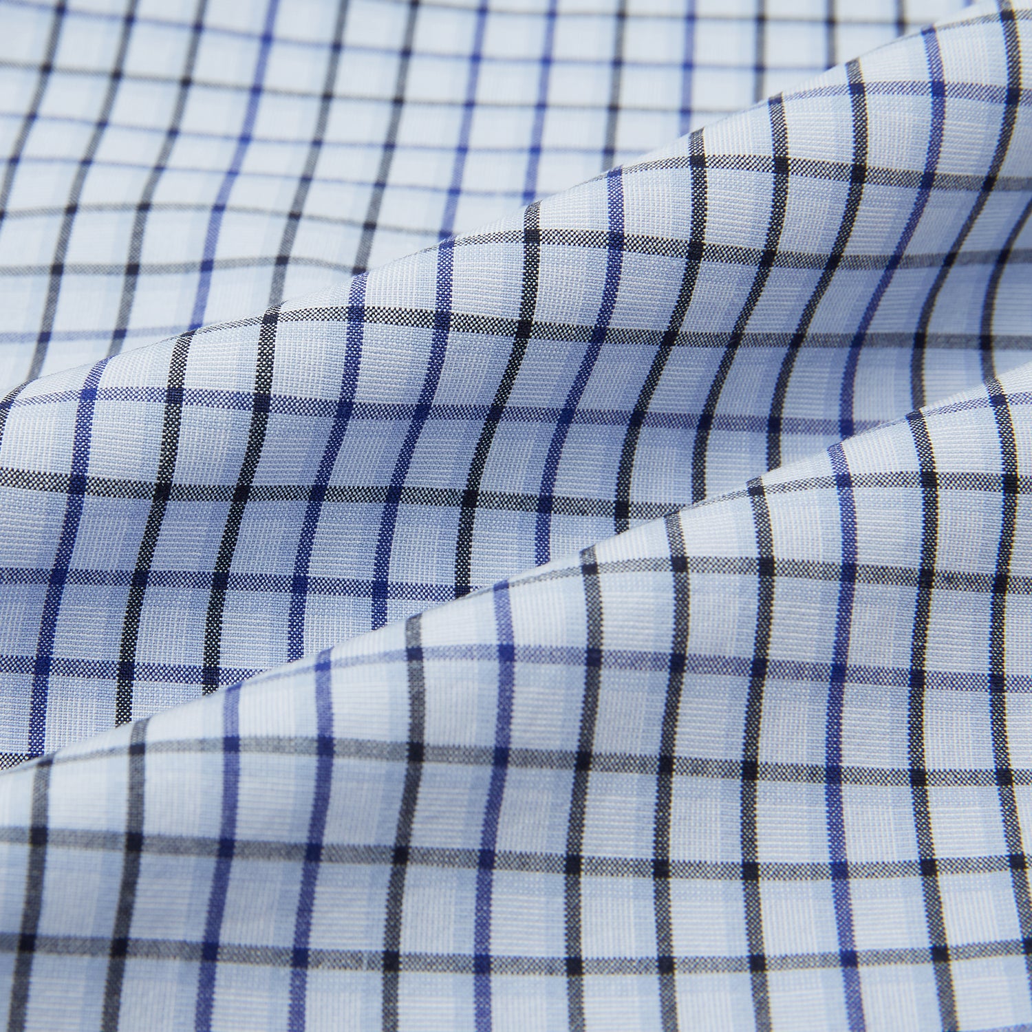 View 6 of product The Turnbull & Asser Blue Shadow Check Pyjama Shirt features long sleeves, a button-up front, collar, and chest pocket—ideal for refined loungewear or stylish nightwear.