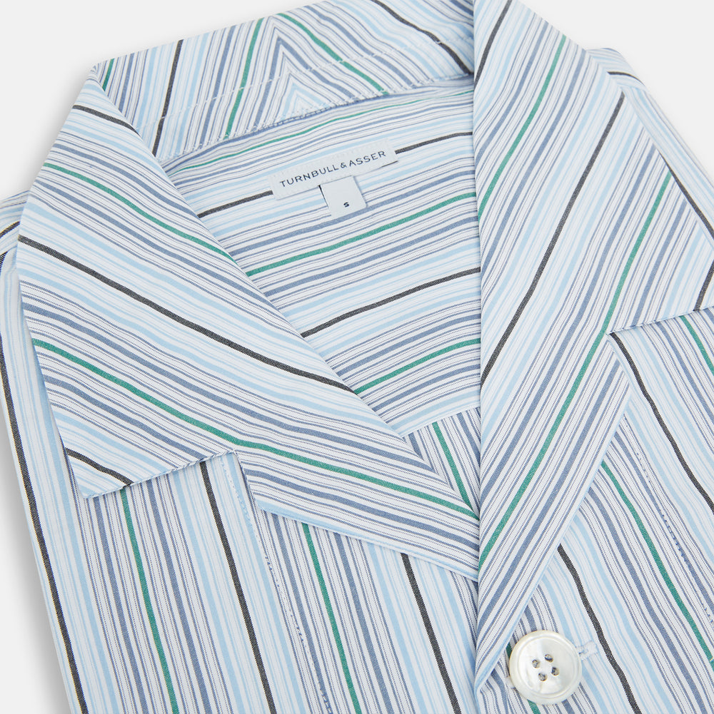The Turnbull & Asser Blue and Green Multi Track Stripe Pyjama Shirt is a long-sleeve, button-up with collar and chest pocket, featuring blue and green stripes—ideal for stylish loungewear or nightwear.