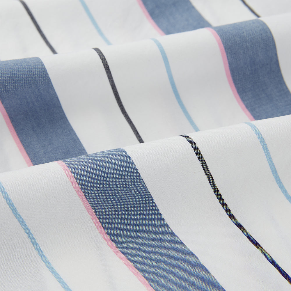 The Turnbull & Asser Blue Blazer Stripe Pyjama Trousers feature blue, white, and light brown vertical stripes and a drawstring waistband, shown laid flat on a white background.